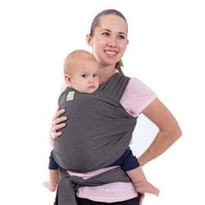 Woman holding baby with a wraparound carrier