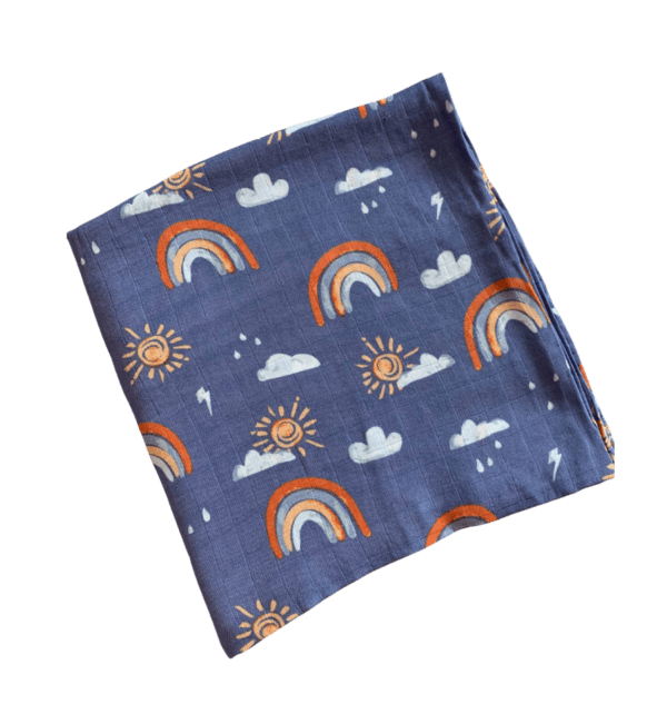 Blue baby swaddle blanket with rainbows and sunshines