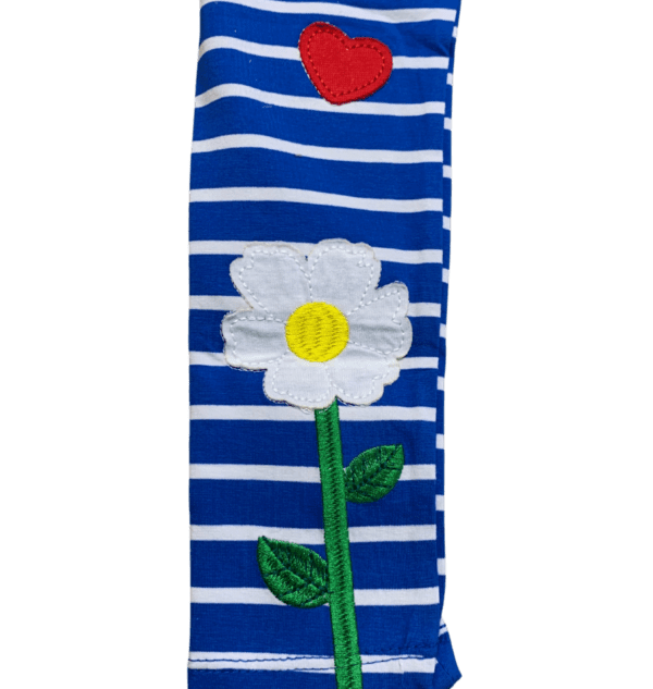 Blue and white striped kids leggings with flowers and bug appliques sown on the front