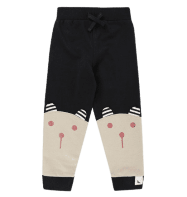 Color block beige and black toddler sweatpants with embroidered bearface on the knees